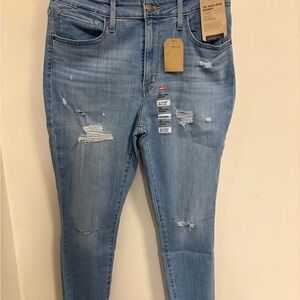 Levi's High Rise Blue Denim Jeans with Distressed Details